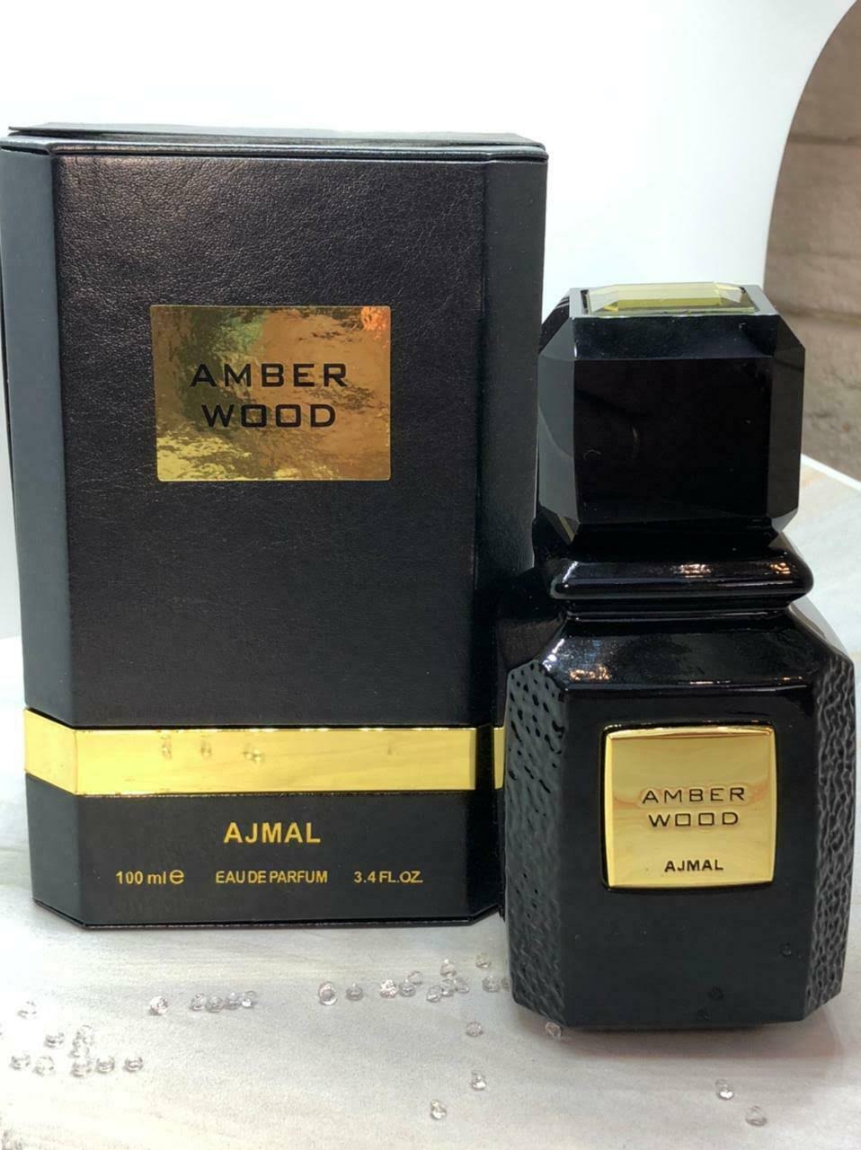 Amber Wood by Ajmal Eau De Parfum Spray 3.4 oz Unisex