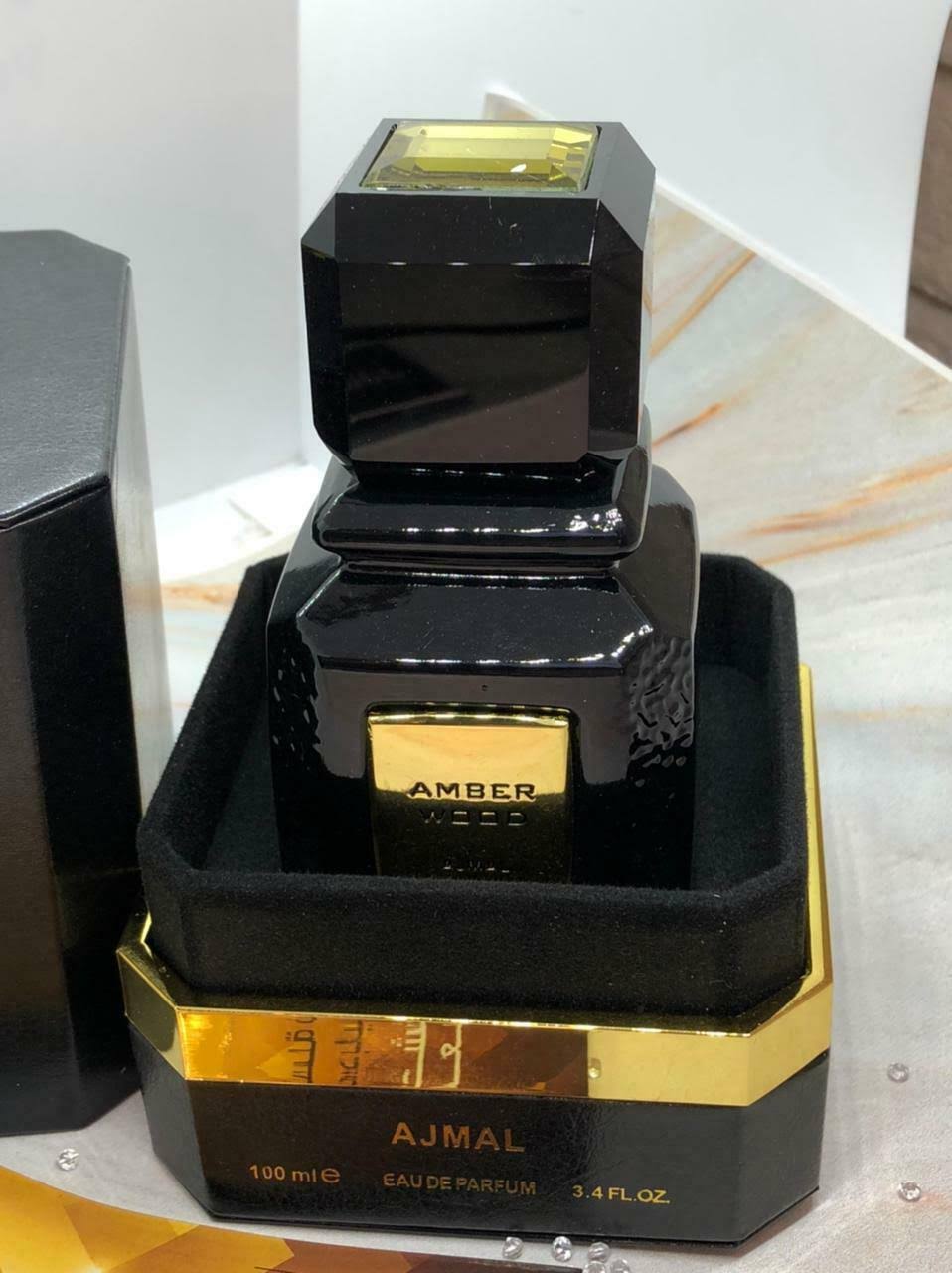 Amber Wood by Ajmal Eau De Parfum Spray 3.4 oz Unisex