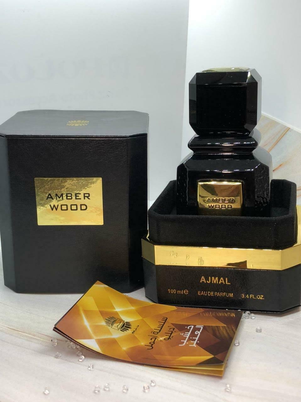 Amber Wood by Ajmal Eau De Parfum Spray 3.4 oz Unisex