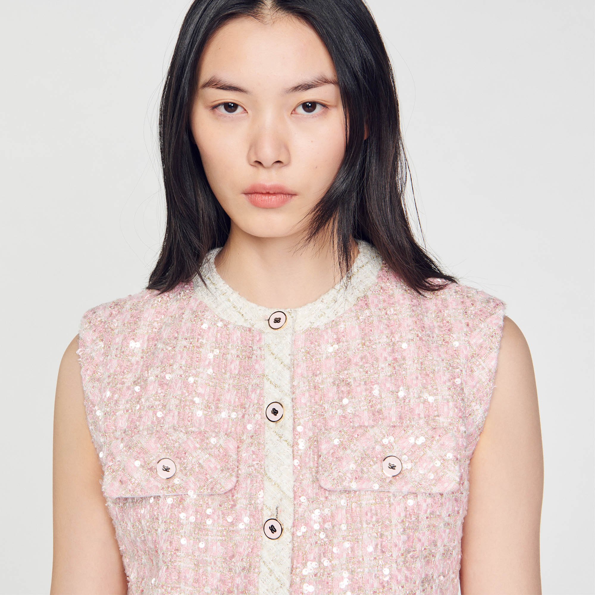 Sleeveless tweed jacket