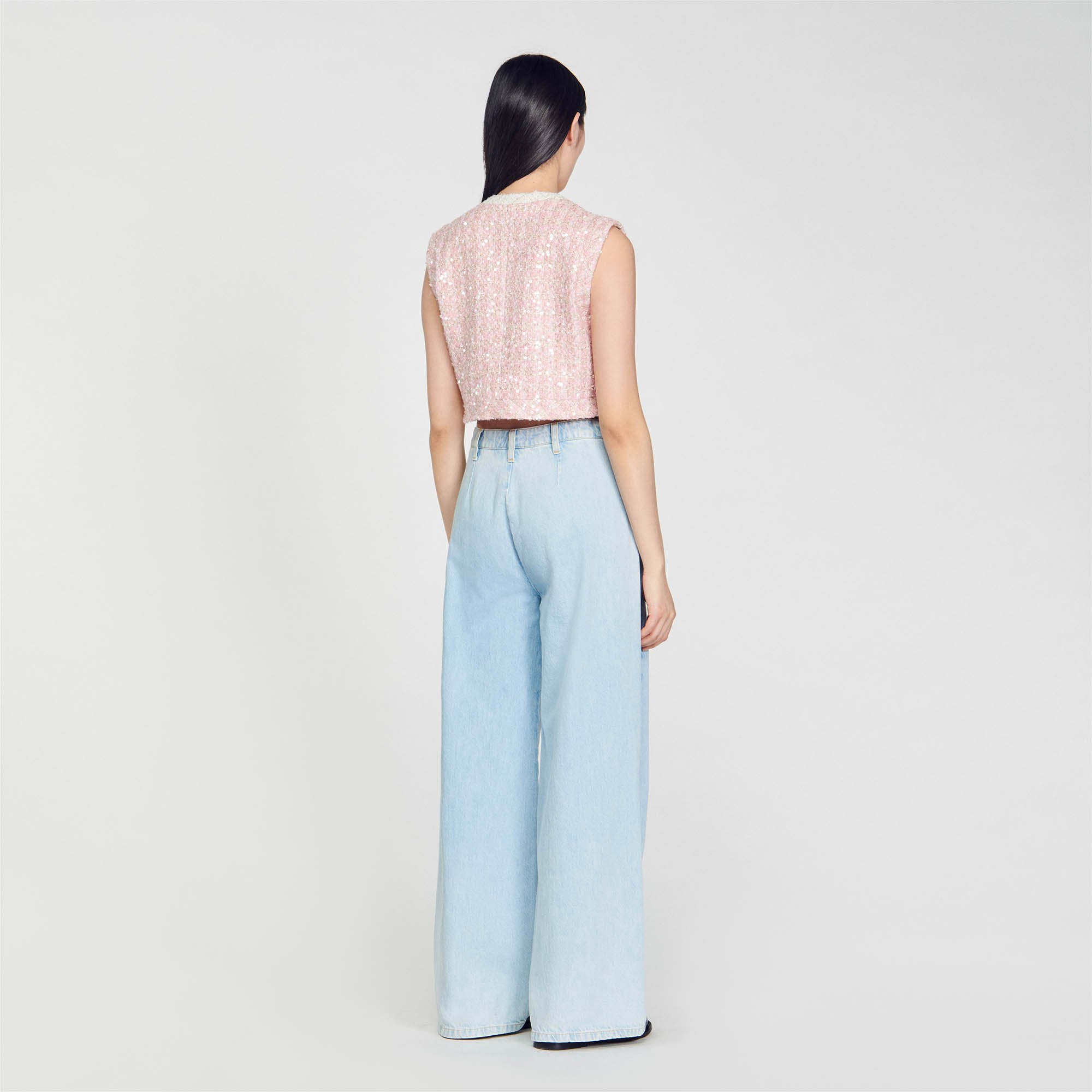 Sleeveless tweed jacket