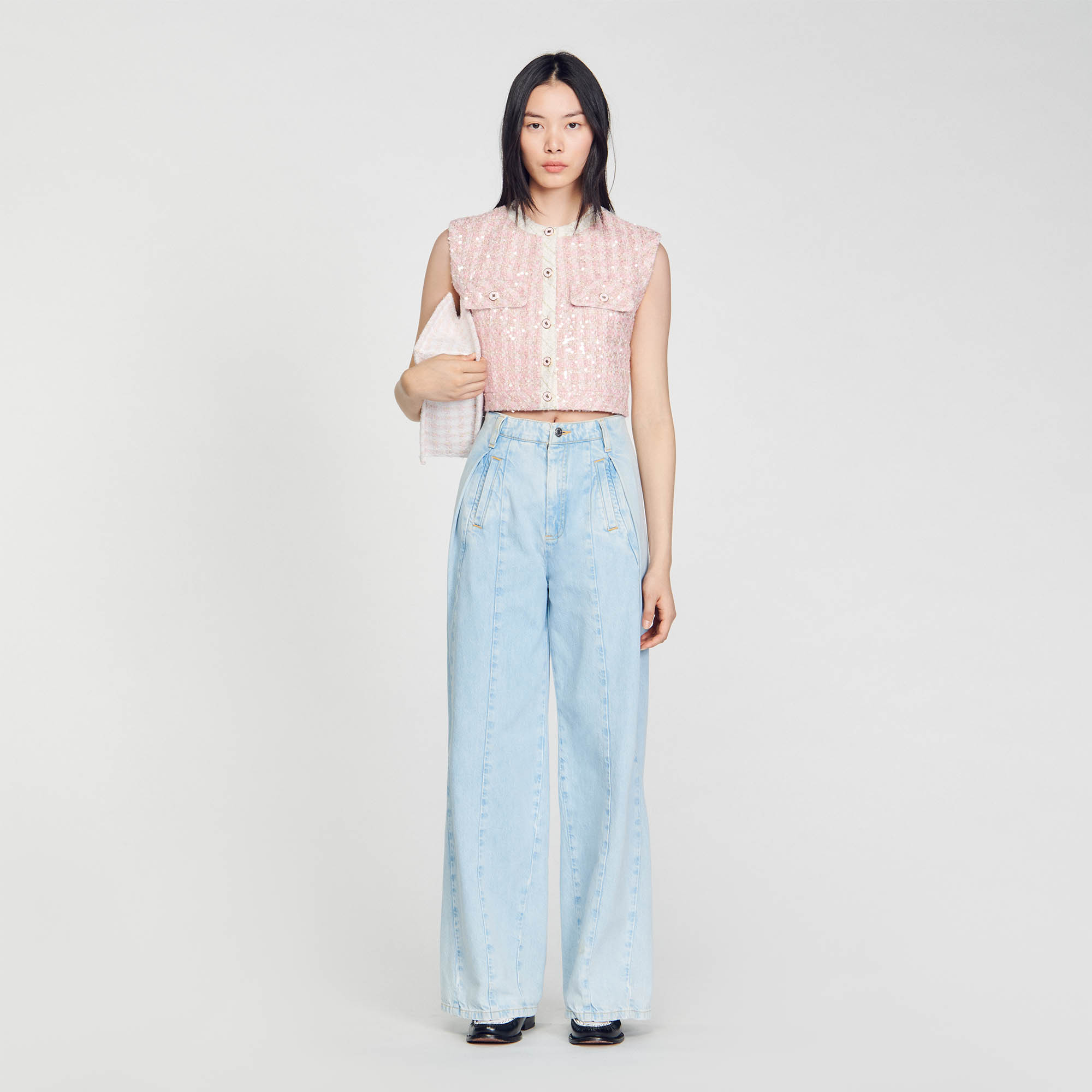 Sleeveless tweed jacket