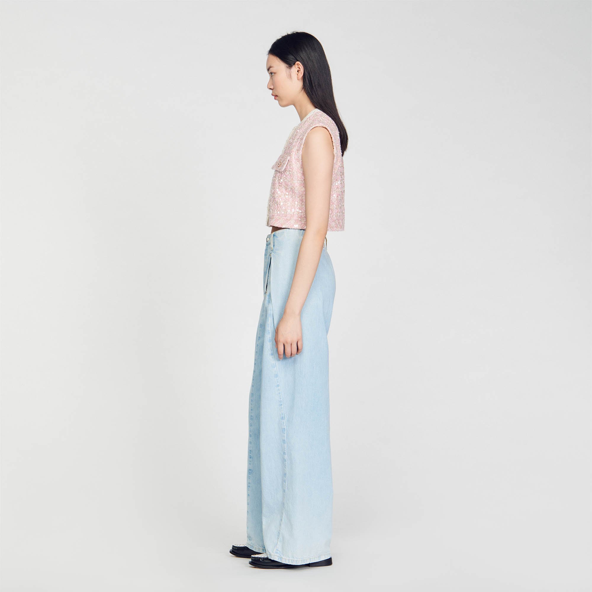 Sleeveless tweed jacket