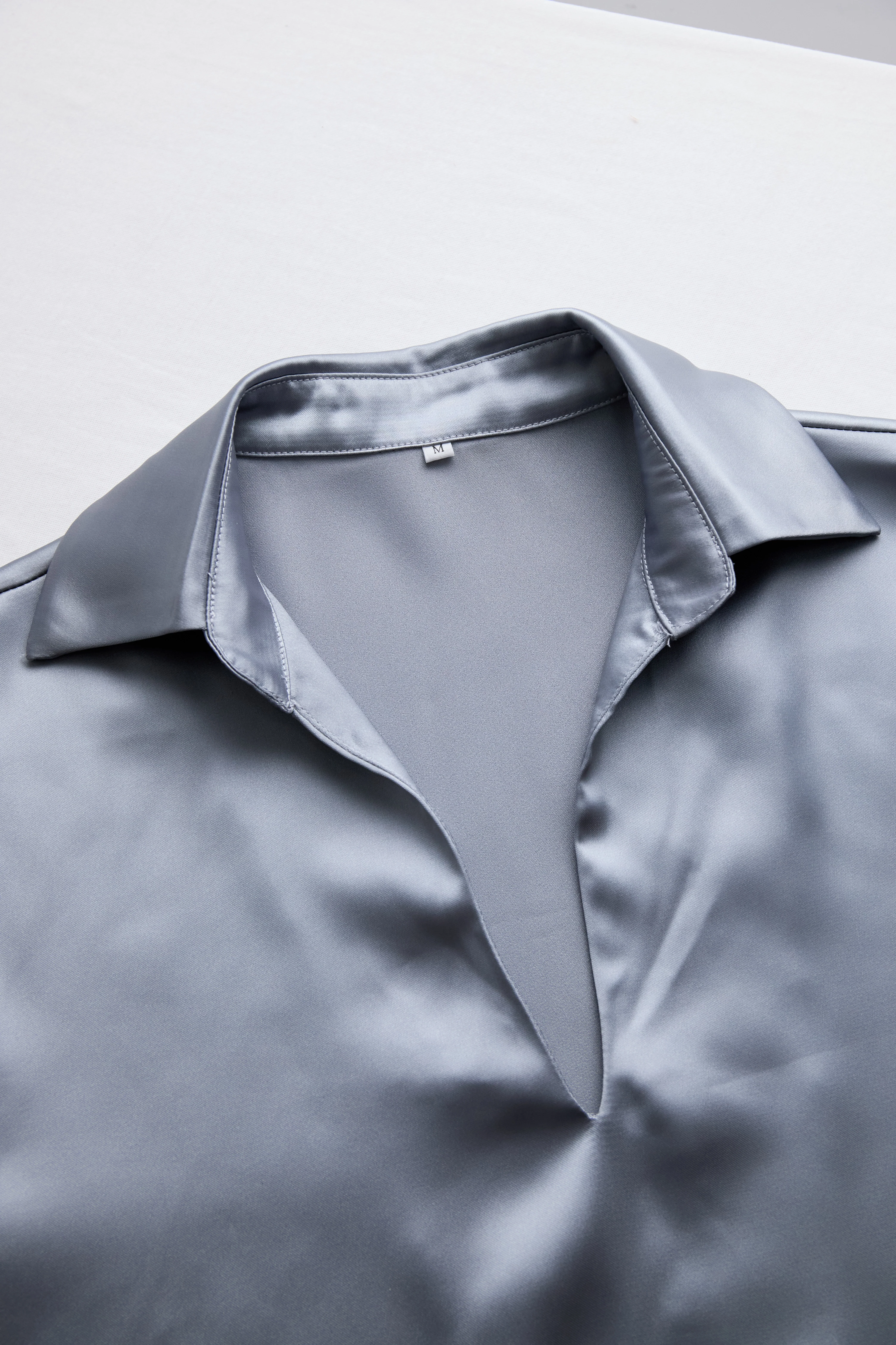 Silver Satin Blouse with Plunging V-Neck
