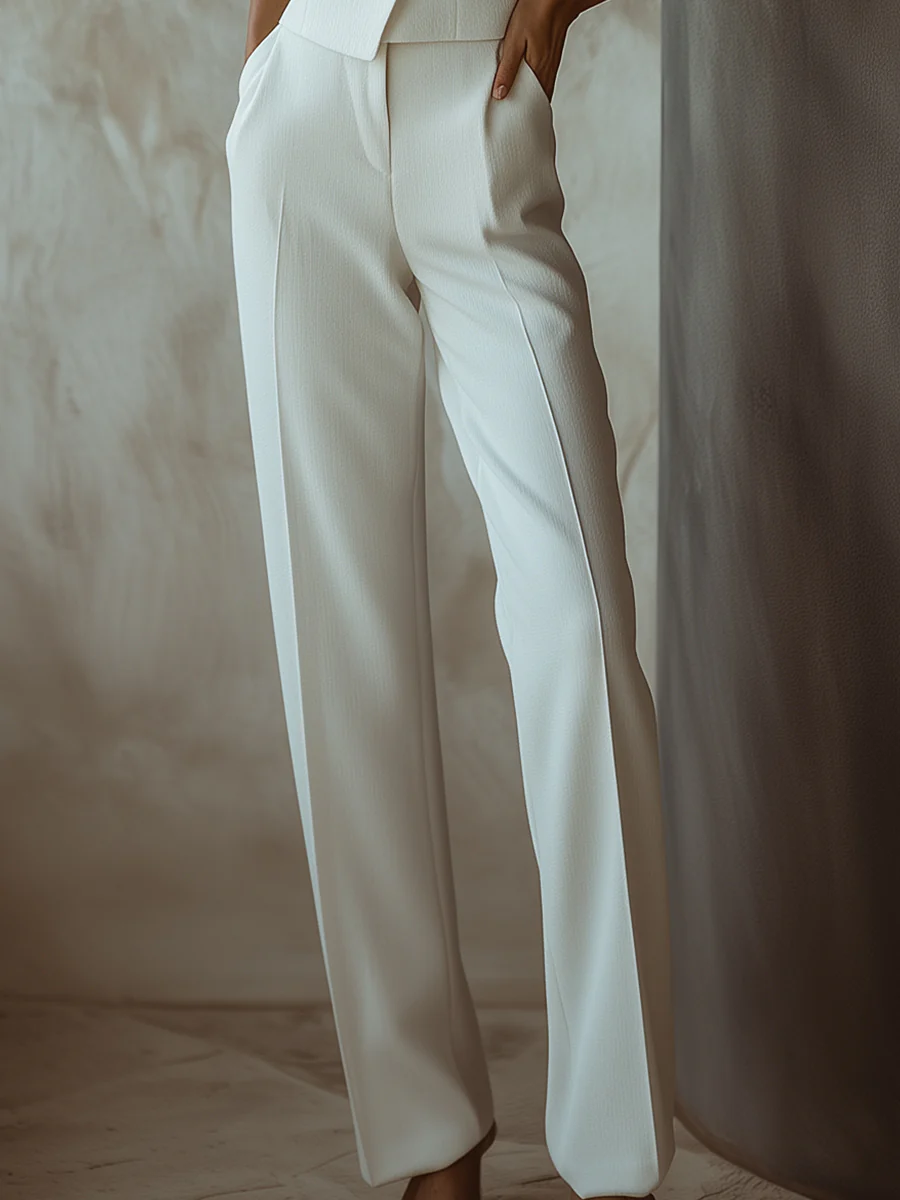 Elegant White Sleeveless Blazer with Matching Straight-Leg Pants