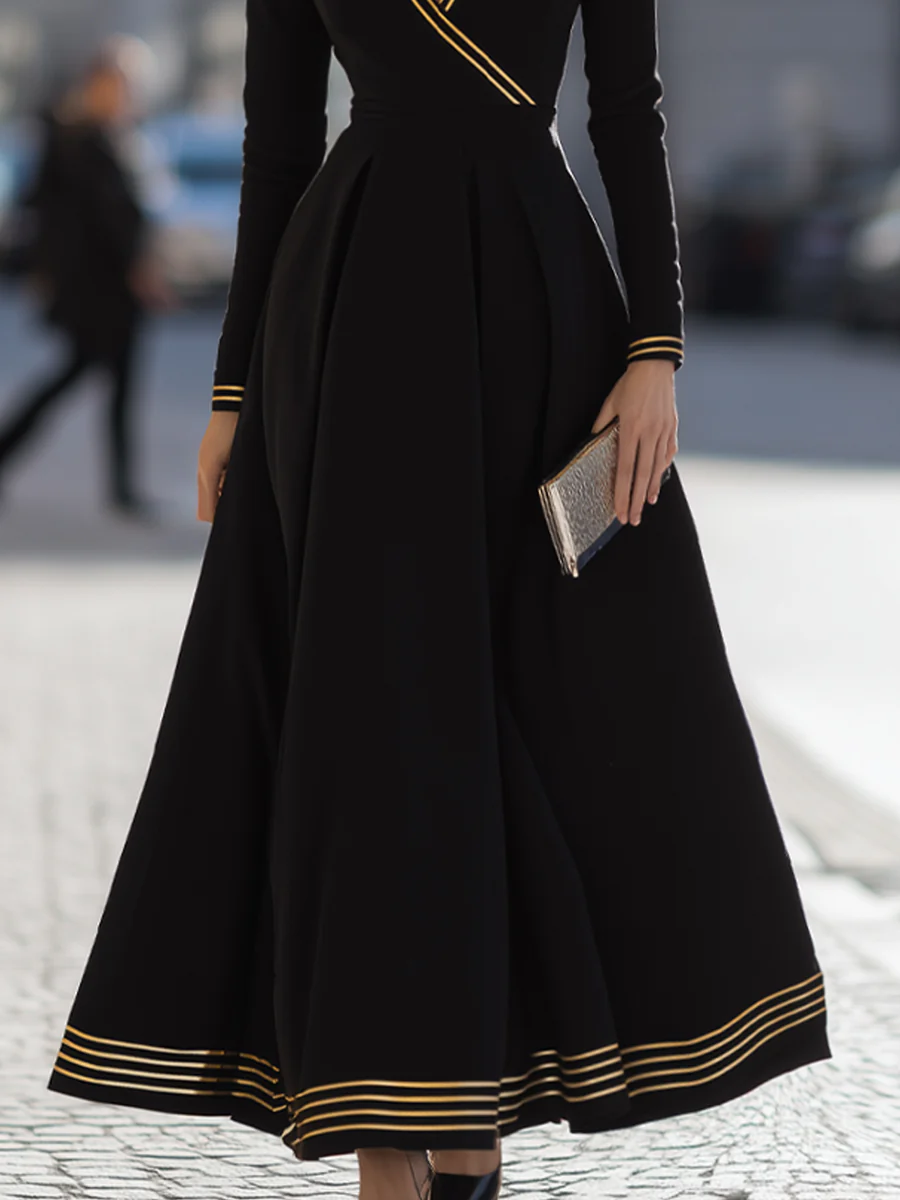 Black Dress With Yellow Stripes And Pleated Skirt