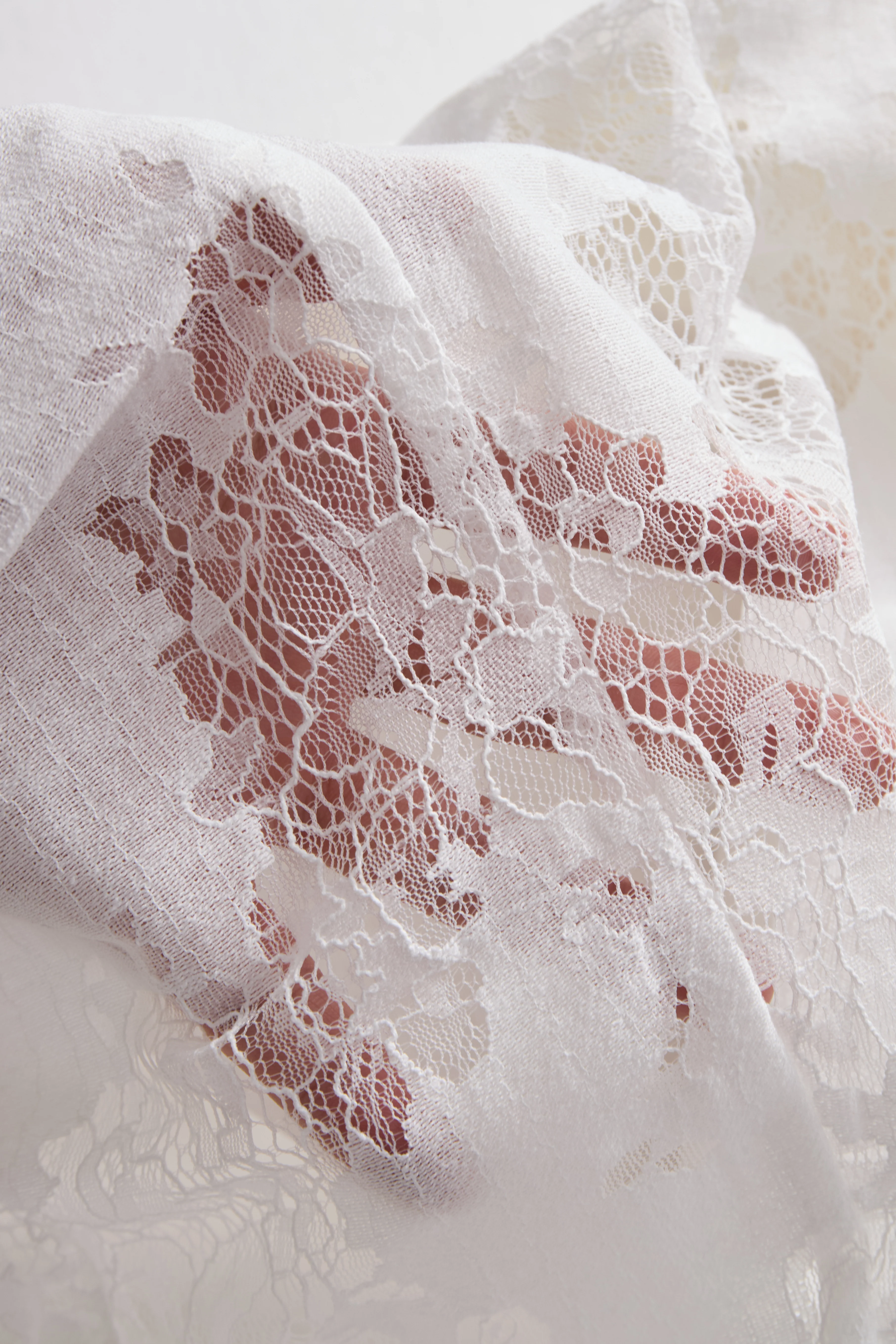 Elegant White Lace-Backed Blazer with Structured Silhouette