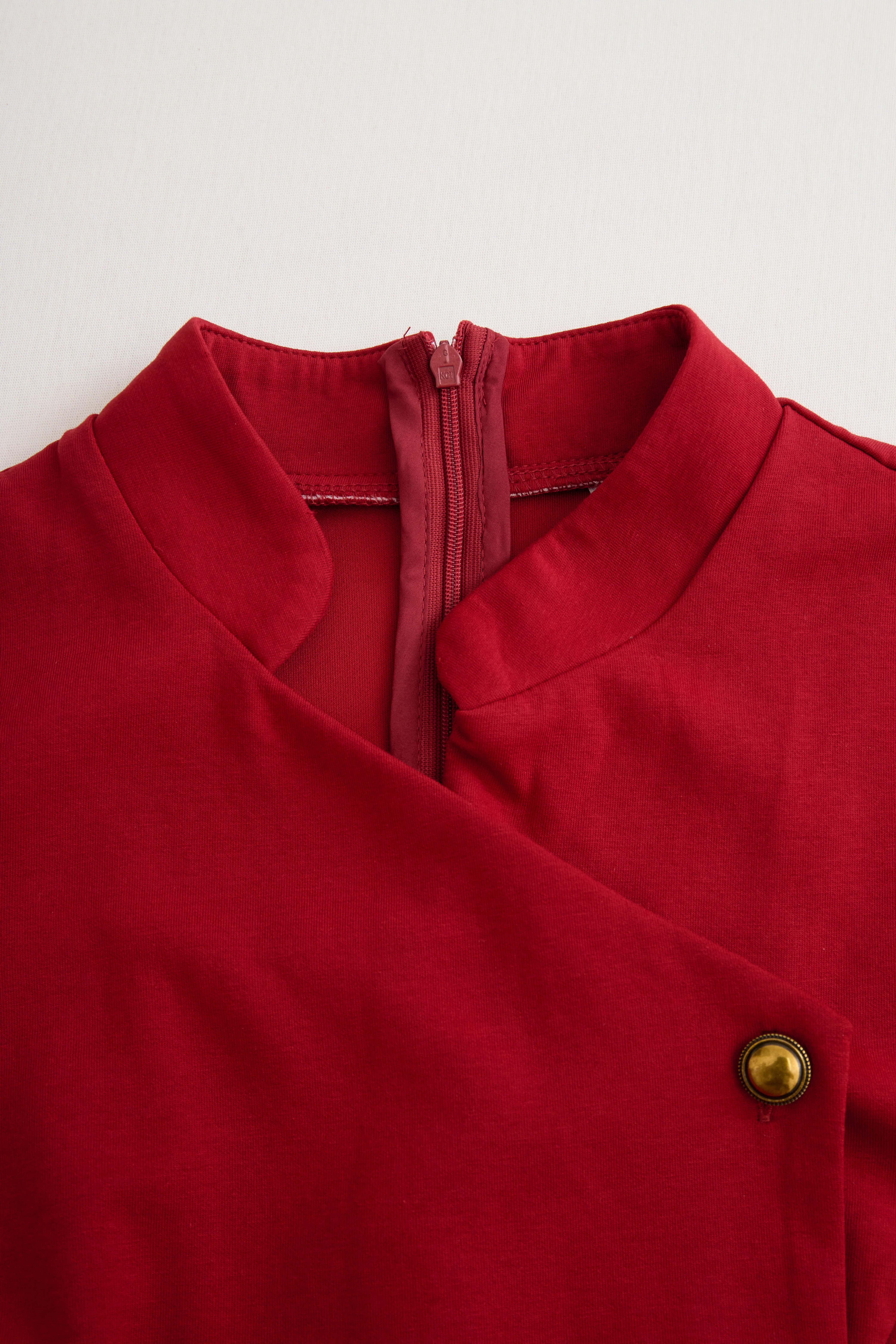 Sophisticated Burgundy Sleeveless Midi Dress with Asymmetrical Button