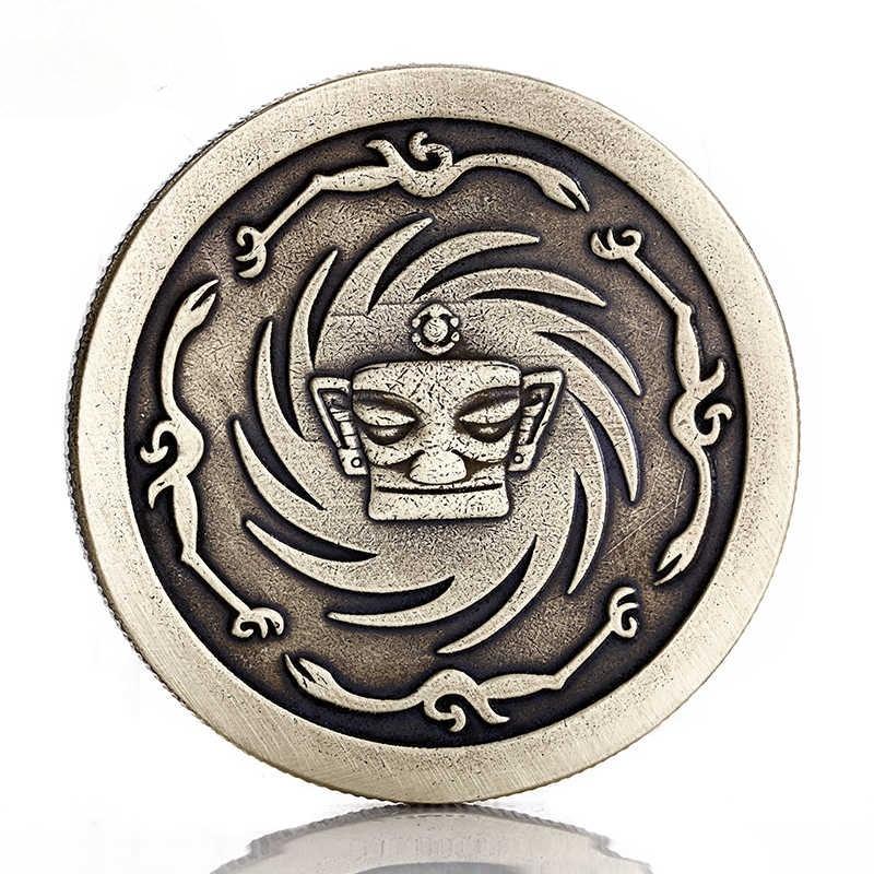 Sanxingdui gold mask coin